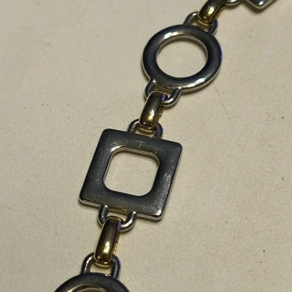Women’s silver & gold tone belt size XL